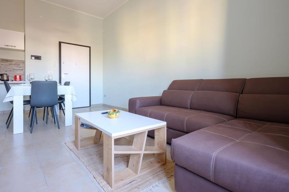 Comfort Apartment, City View | Living area | Flat-screen TV