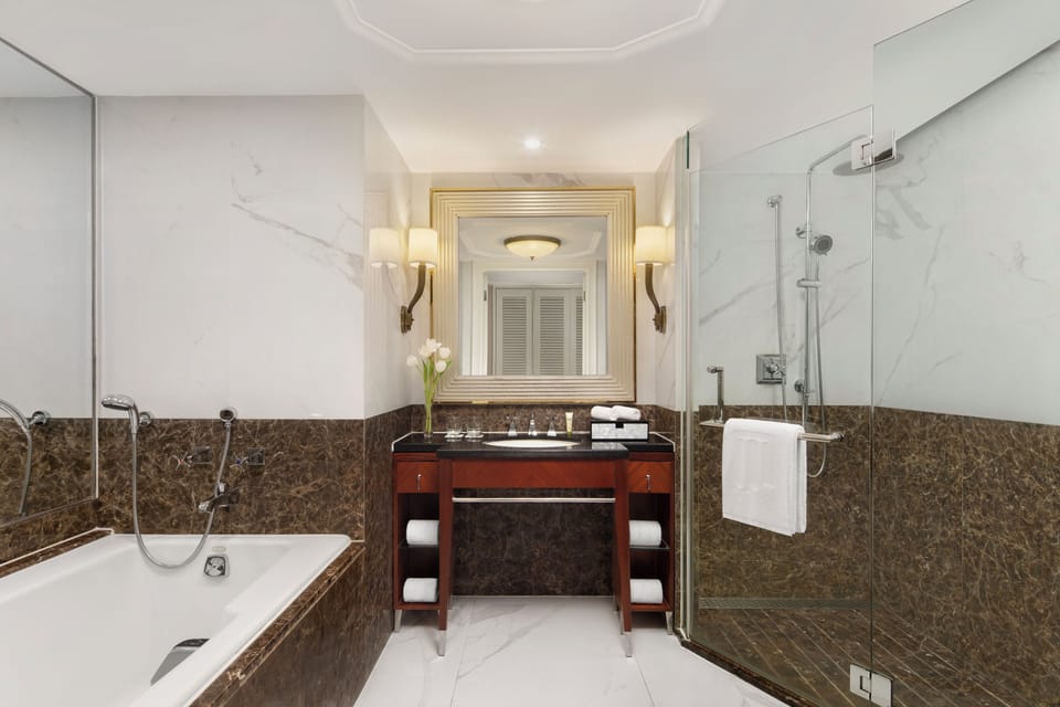 Separate tub and shower, rainfall showerhead, free toiletries
