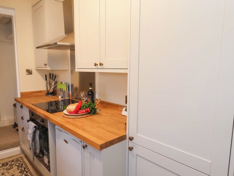 Fridge, microwave, cookware/dishes/utensils
