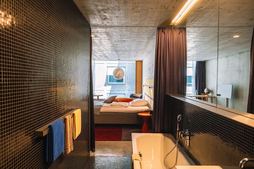 Design Signature Junior Suite | Bathroom | Free toiletries, hair dryer, bathrobes, slippers
