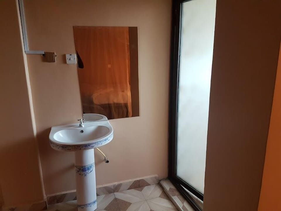 Shower, slippers, towels, soap