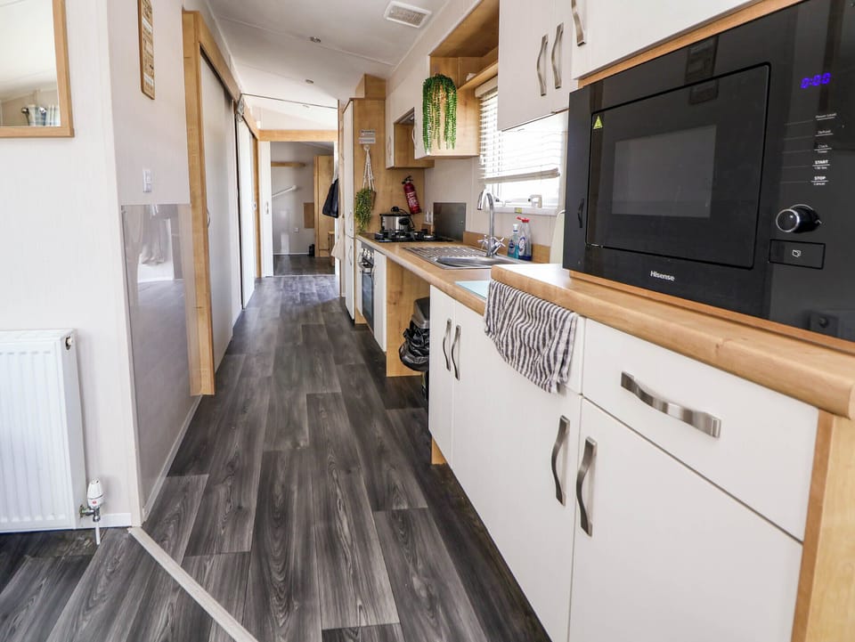 Fridge, microwave, toaster, cookware/dishes/utensils