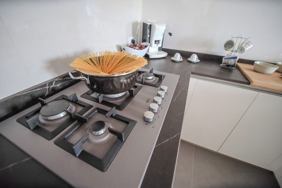 Apartment, Balcony | Private kitchen | Coffee/tea maker, electric kettle