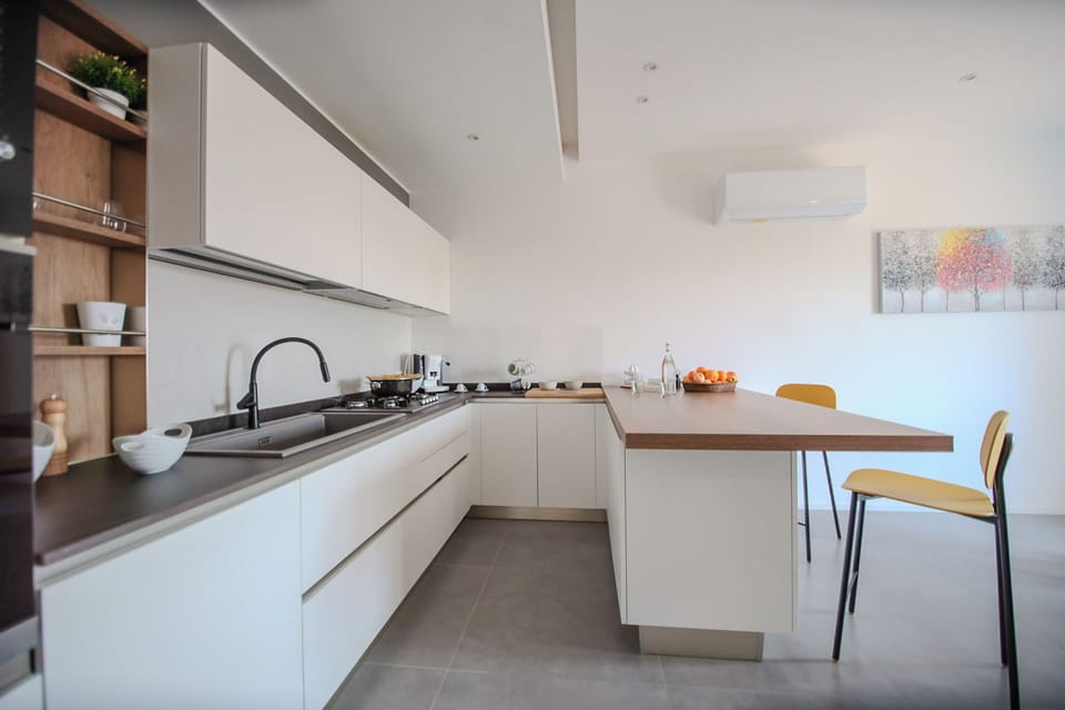 Apartment, Balcony | Private kitchen | Coffee/tea maker, electric kettle