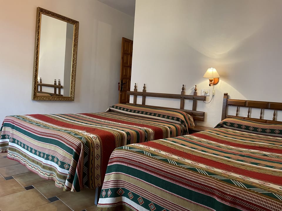 Economy Triple Room | Blackout drapes, free WiFi, bed sheets
