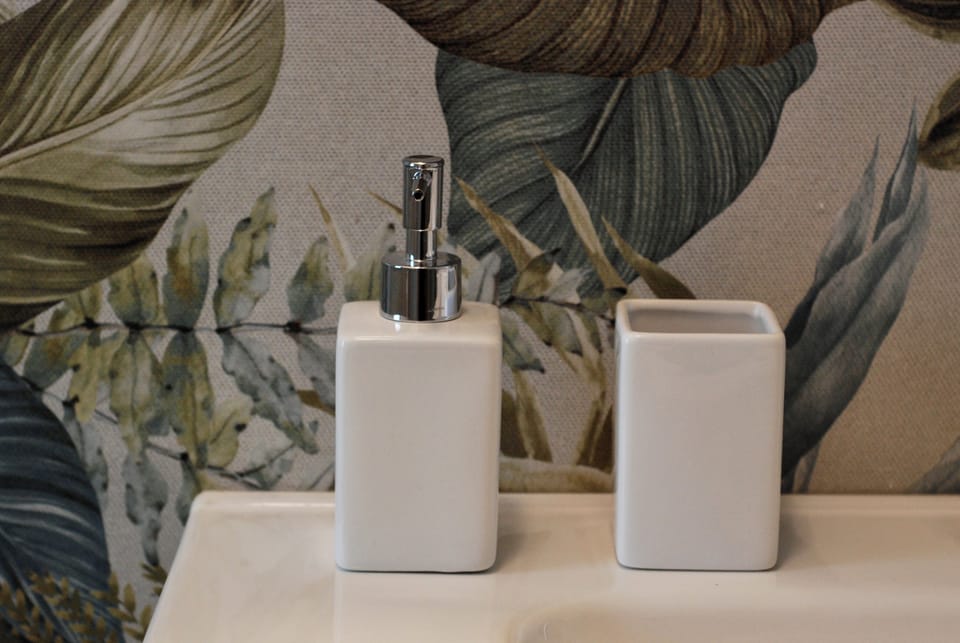 Deluxe Double or Twin Room, 1 Bedroom | Bathroom | Shower, hair dryer, slippers, bidet