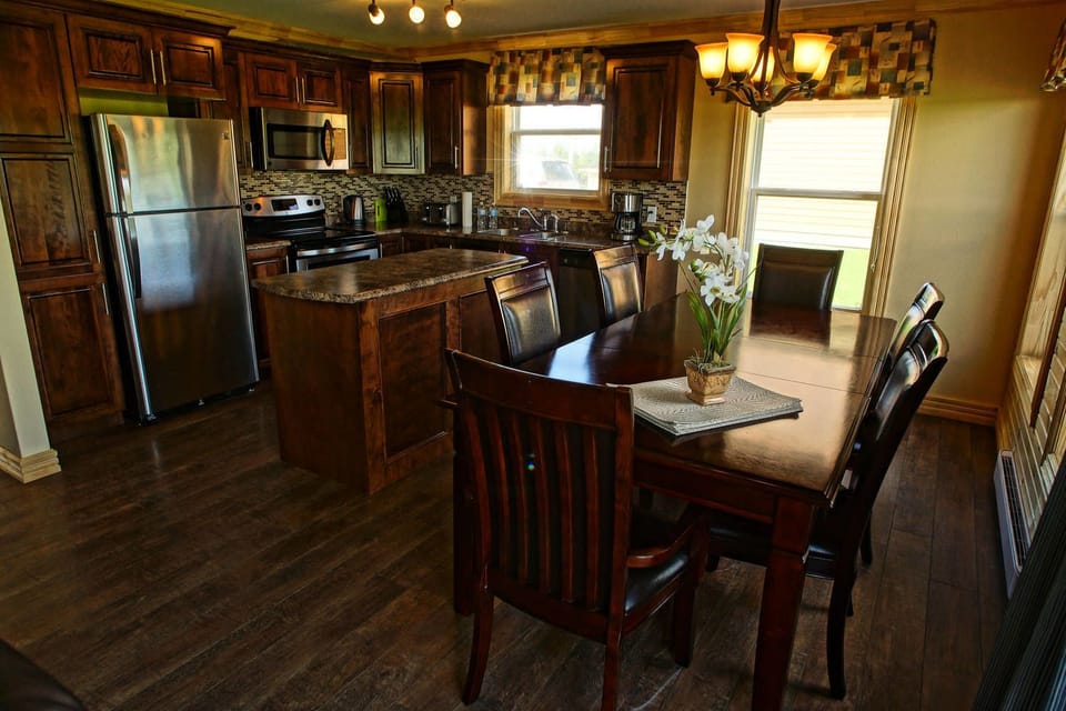 Family Cottage | Private kitchen | Mini-fridge, highchair