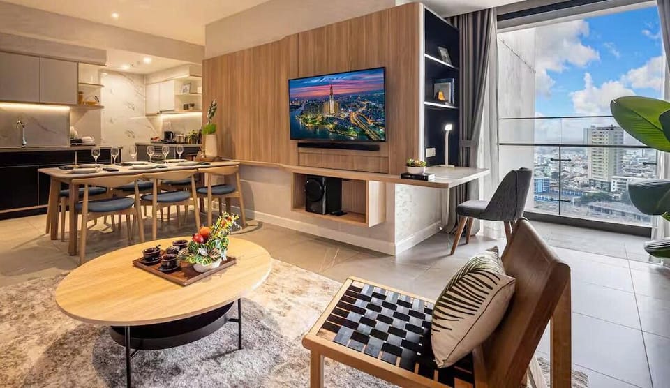 Executive Apartment, 3 Bedrooms | Living area | 42-inch Smart TV with cable channels