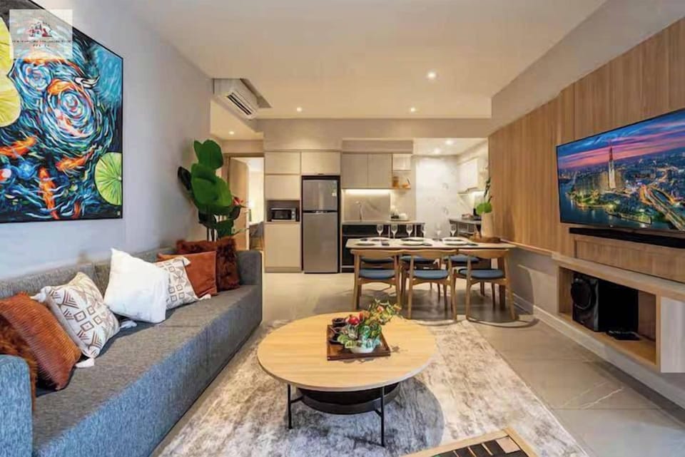 Executive Apartment, 3 Bedrooms | Living area | 42-inch Smart TV with cable channels