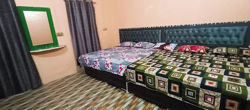 Deluxe Triple Room, City View | In-room safe, soundproofing, bed sheets