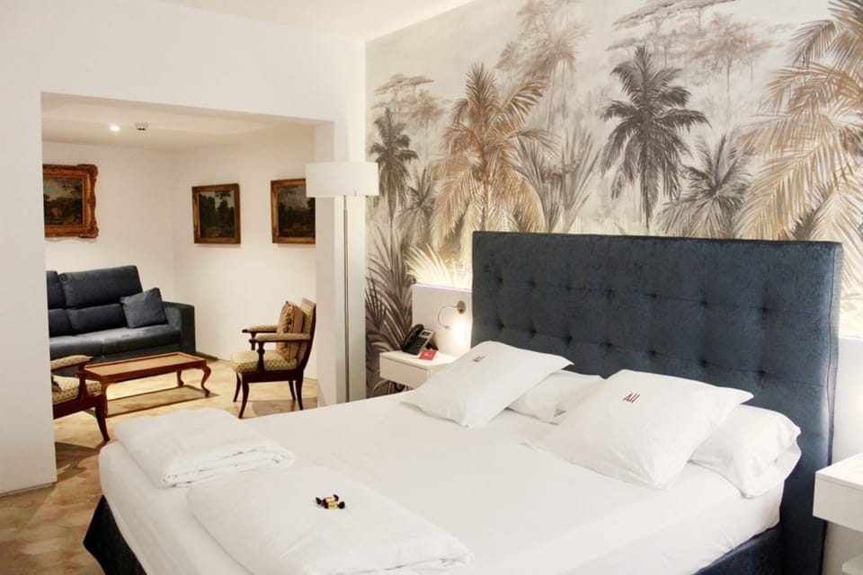 Premium bedding, down comforters, pillowtop beds, minibar