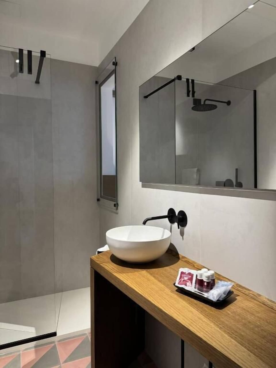 Shower, free toiletries, hair dryer, slippers