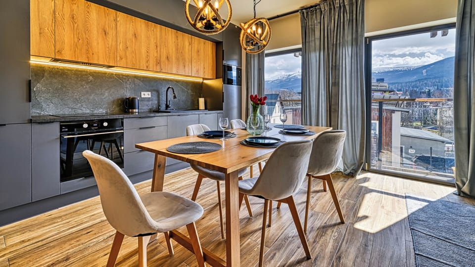 Apartment (03) | Private kitchen | Fridge, stovetop, electric kettle, cookware/dishes/utensils
