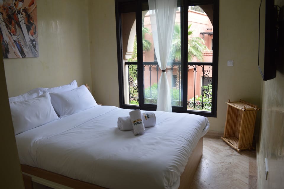 Apartment, Garden View, Poolside | Blackout drapes, soundproofing, free WiFi