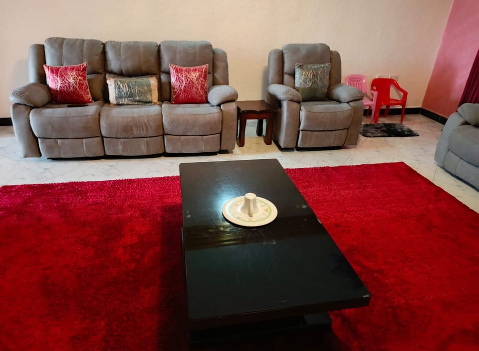 Deluxe Apartment, City View | Living area | 32-inch Smart TV with digital channels
