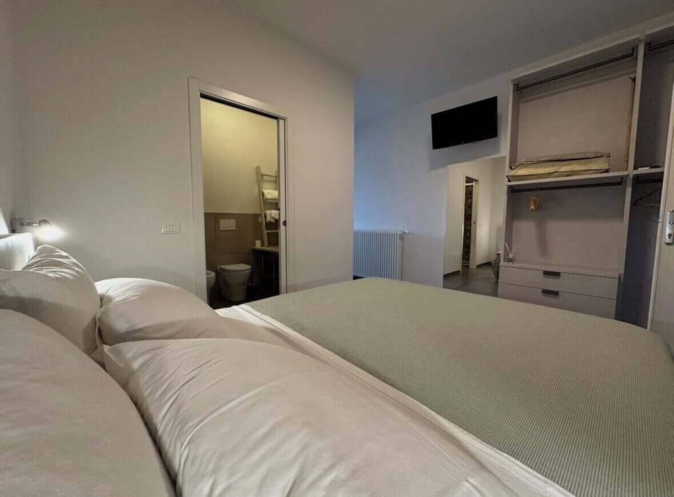Deluxe Triple Room, Mountain View | In-room safe, blackout drapes, iron/ironing board, free WiFi