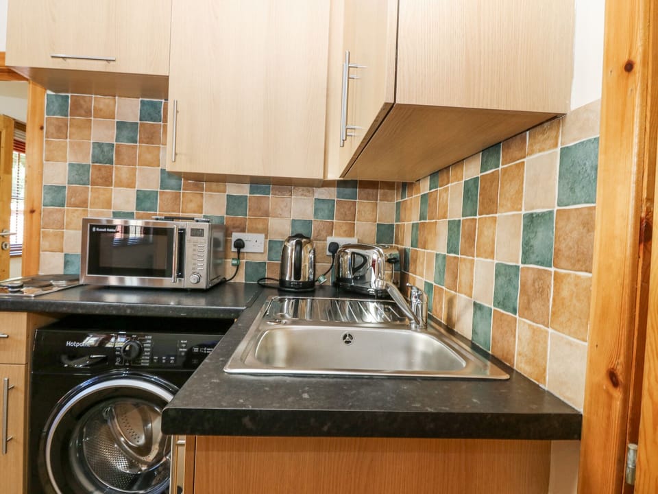 Fridge, microwave, toaster, cookware/dishes/utensils