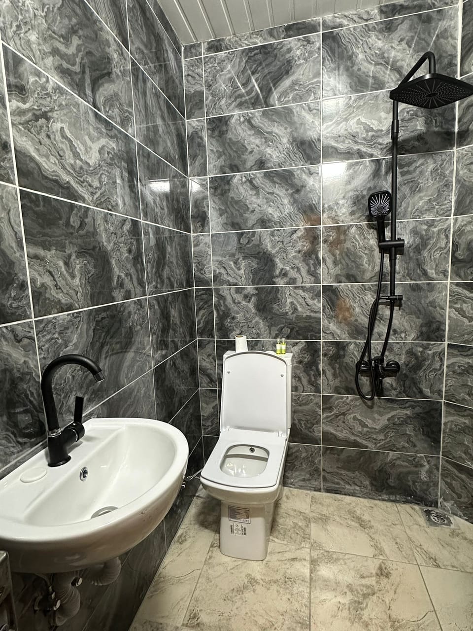 Deluxe Quadruple Room, Garden View | Bathroom | Shower, hair dryer, towels, soap