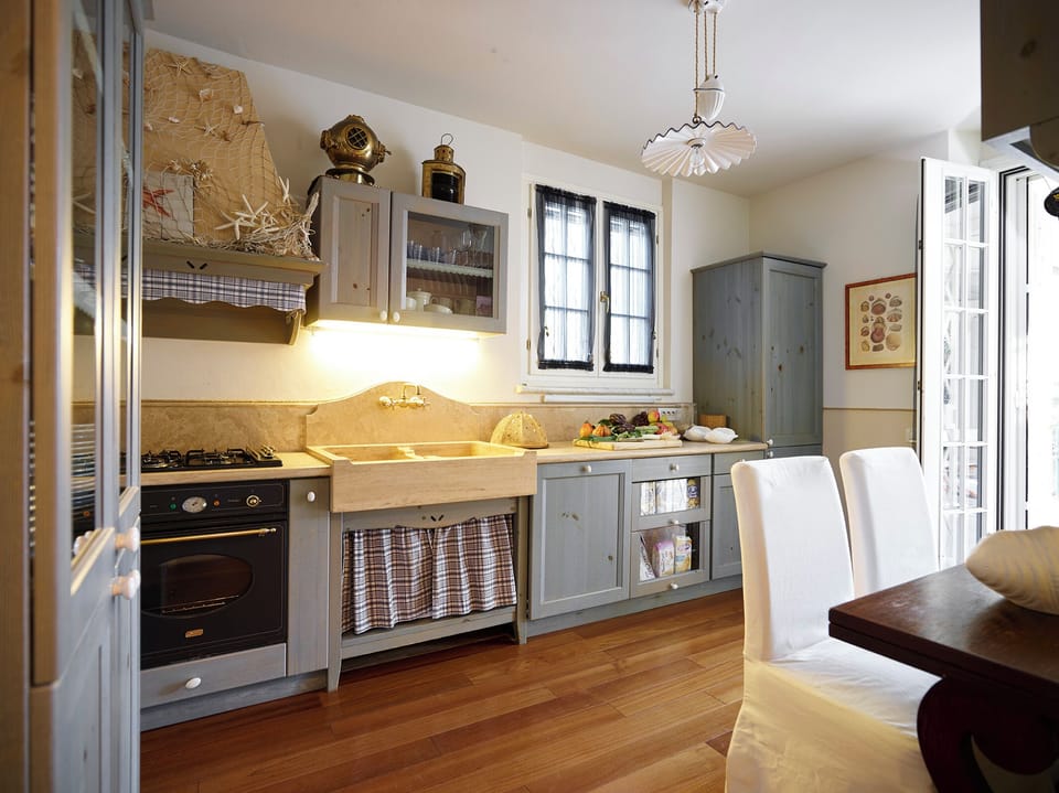Villa | Private kitchen | Fridge, microwave, oven, stovetop