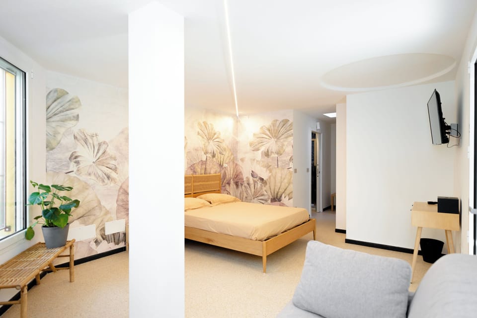 Family Triple Room, Patio | Desk, laptop workspace, free WiFi