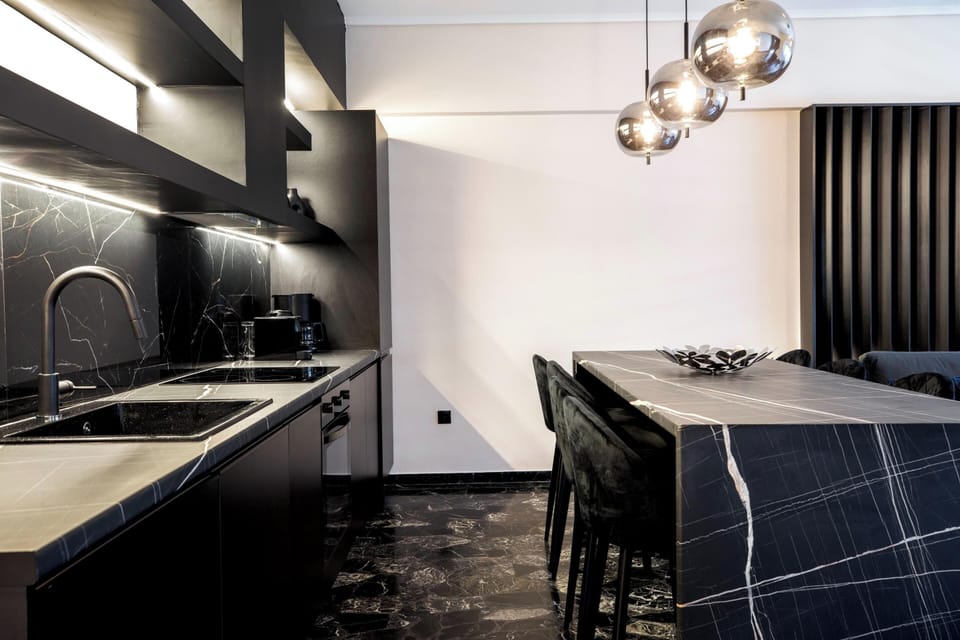 Apartment, City View | Private kitchen | Full-size fridge, oven, dishwasher, espresso maker