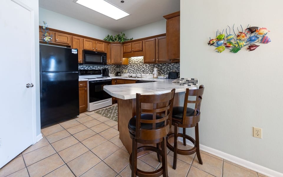 Condo, 2 Bedrooms | Private kitchen | Coffee/tea maker, fridge, oven