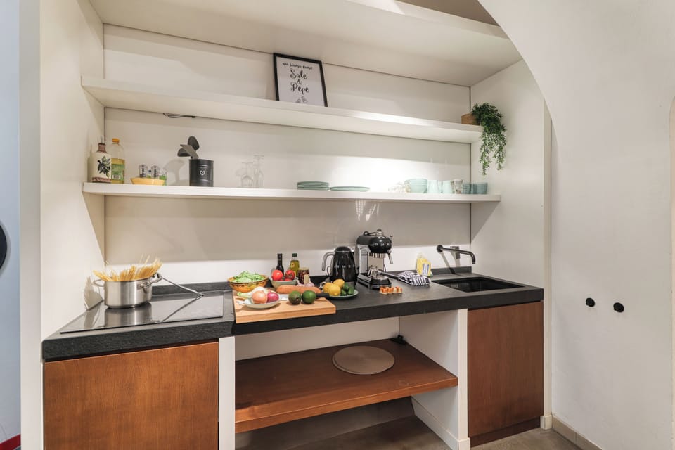 Honeymoon Apartment, Multiple Bedrooms (Boutique Apartment I Cavalieri) | Private kitchen | Fridge, stovetop, coffee/tea maker, electric kettle