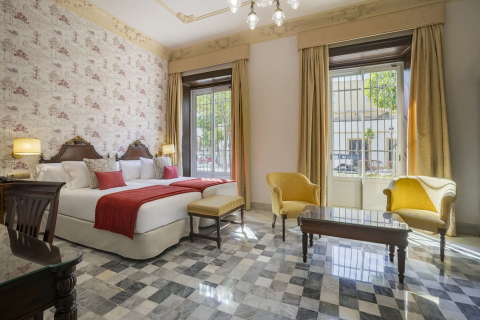 Deluxe Double or Twin Room | Minibar (some free items), in-room safe, desk, blackout drapes
