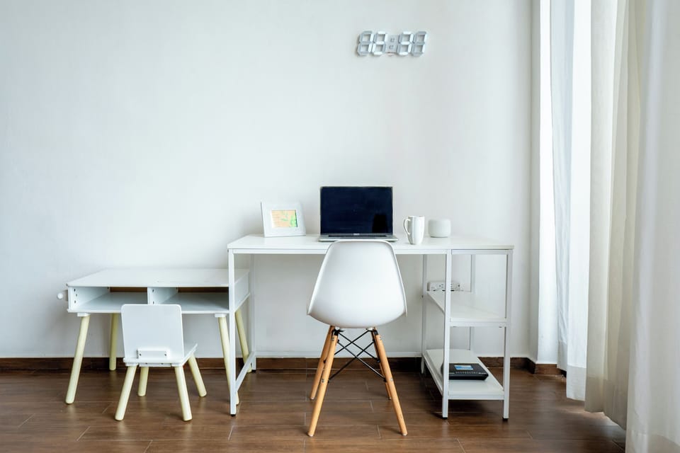 Family Apartment, Balcony, Garden View | Living area | 50-inch Smart TV with cable channels, Netflix, streaming services