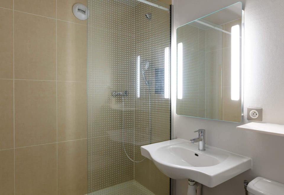 Shower, free toiletries, hair dryer, towels