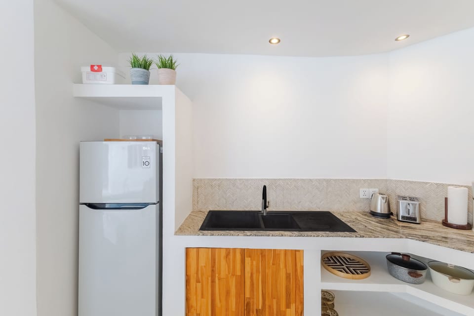 Family Villa, Garden View | Private kitchen | Fridge, microwave, stovetop, electric kettle
