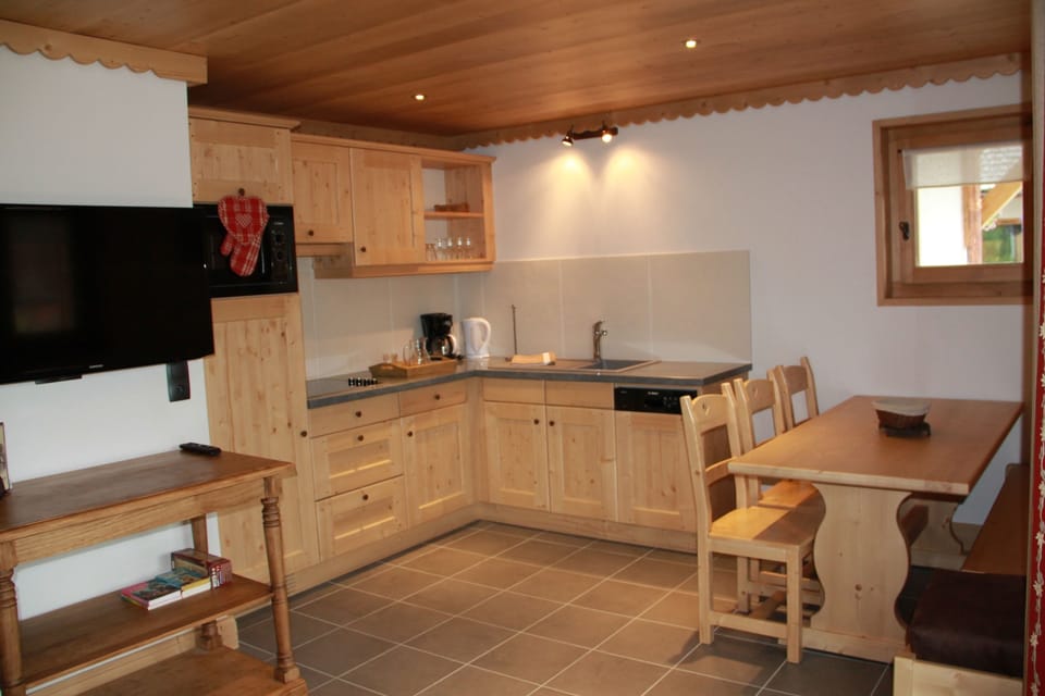 Family Apartment | Private kitchen | Coffee/tea maker, electric kettle, highchair