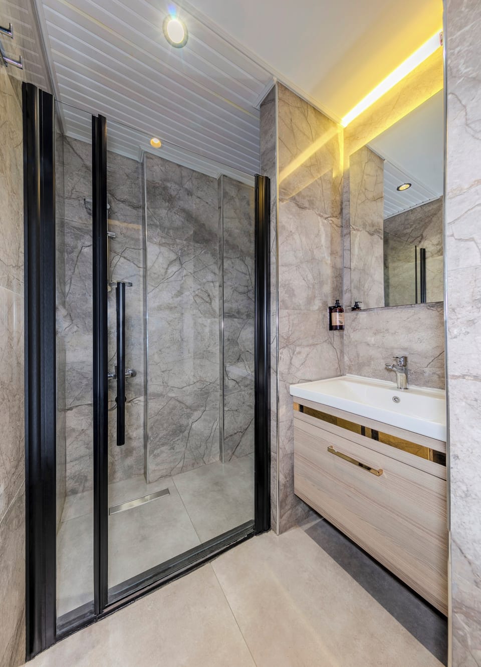 Shower, hair dryer, slippers, towels