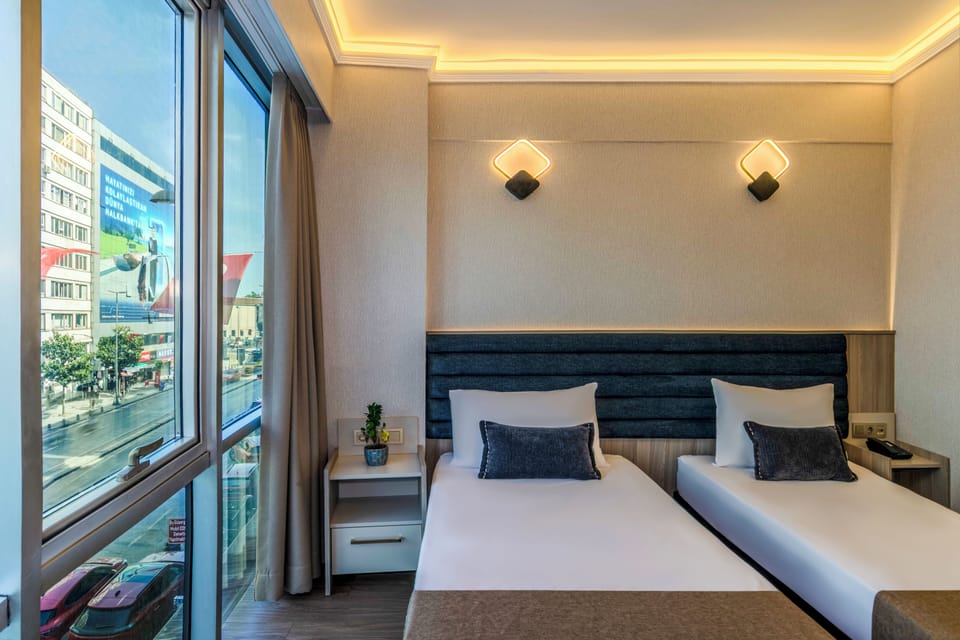 Classic Double or Twin Room, City View | In-room safe, desk, soundproofing, iron/ironing board