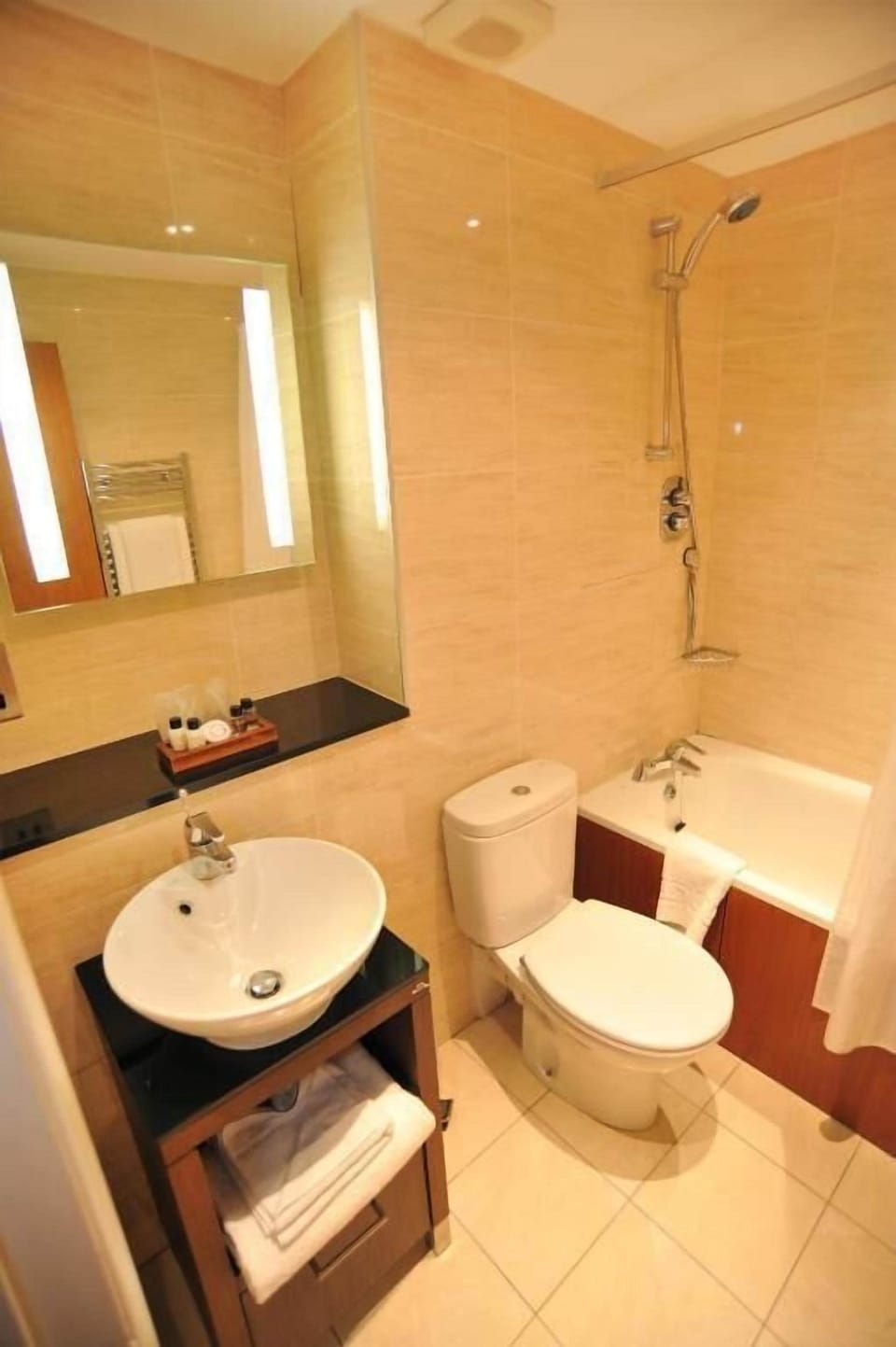 Combined shower/tub, hair dryer, towels, soap
