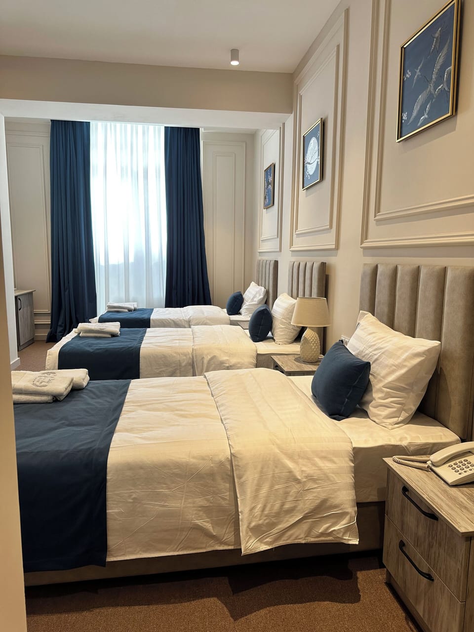Comfort Triple Room, City View | In-room safe, desk, laptop workspace, blackout drapes