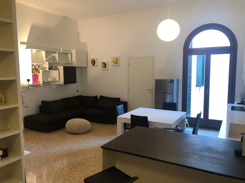 Apartment, Garden View | Living area | Flat-screen TV