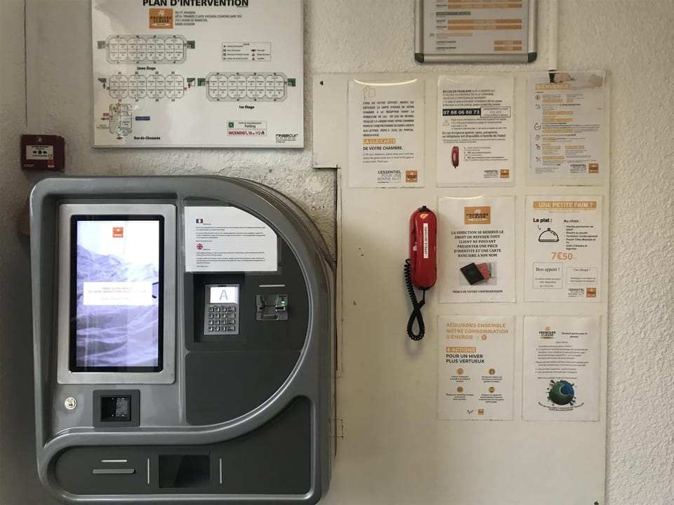 Check-in/check-out kiosk