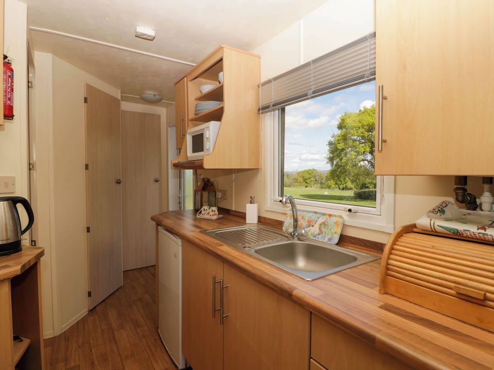 Fridge, microwave, toaster, cookware/dishes/utensils