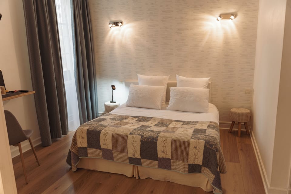 Desk, free WiFi, bed sheets
