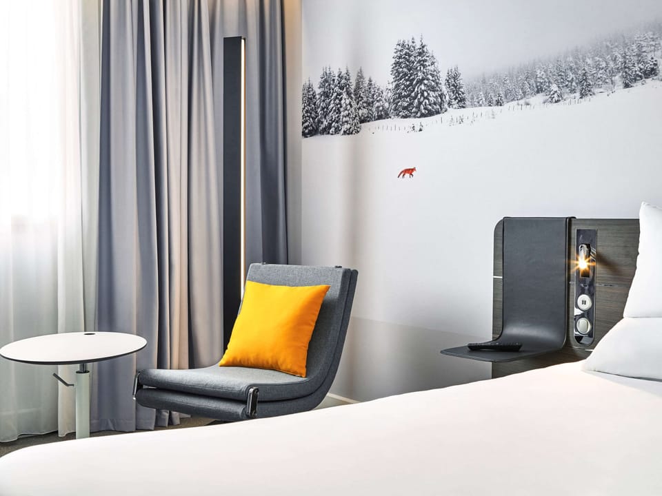 Hypo-allergenic bedding available, down comforters, in-room safe, desk