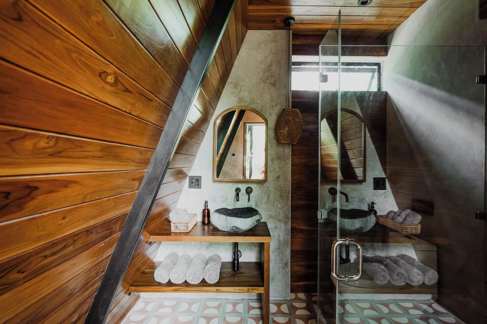 Fuego | Bathroom | Eco-friendly toiletries, hair dryer, bathrobes, towels