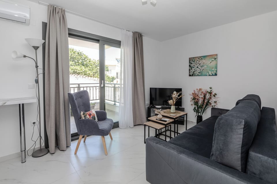 Luxury Apartment, City View | 1 bedroom, in-room safe, blackout drapes, iron/ironing board