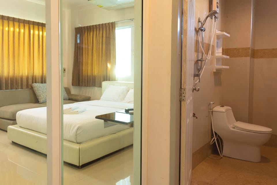 Shower, slippers, bidet, towels