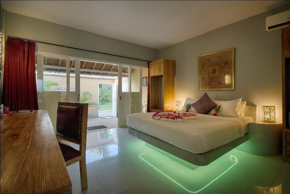 Court Yard Terrace Suite | Minibar, in-room safe, desk, laptop workspace