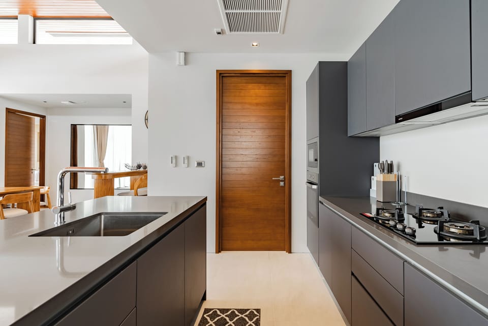Villa | Private kitchen | Dining tables