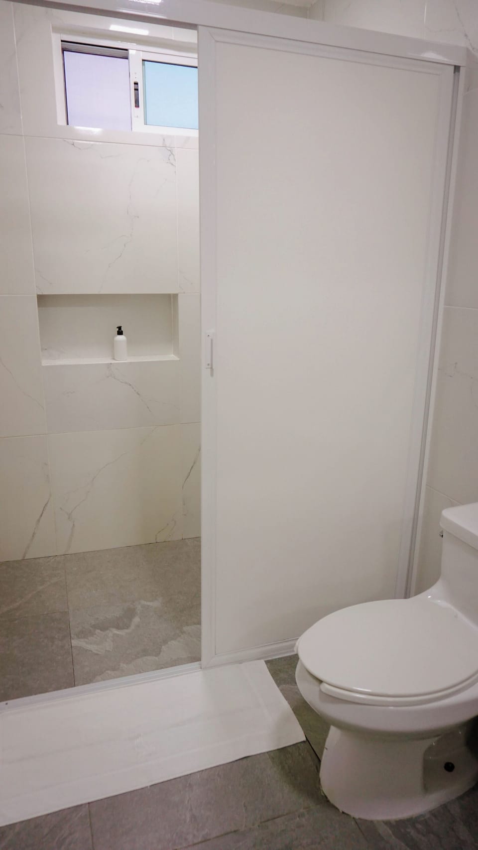Shower, towels, soap, shampoo