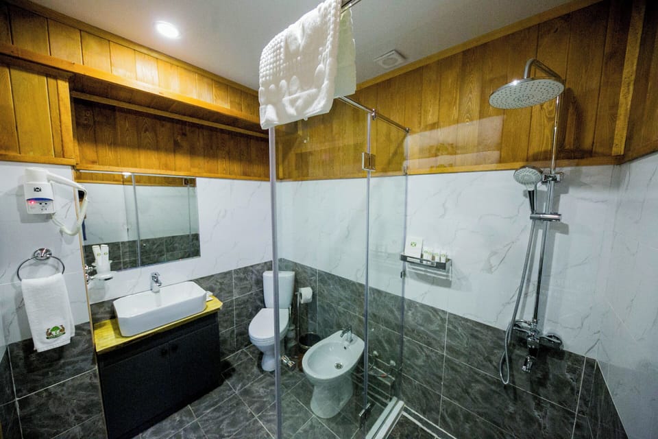 Luxury Quadruple Room, Garden View | Bathroom | Shower, free toiletries, hair dryer, towels