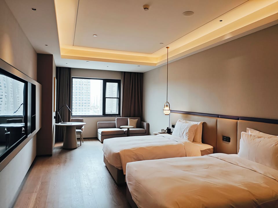 Deluxe City Wall View Twin Room | Premium bedding, minibar, laptop workspace, soundproofing