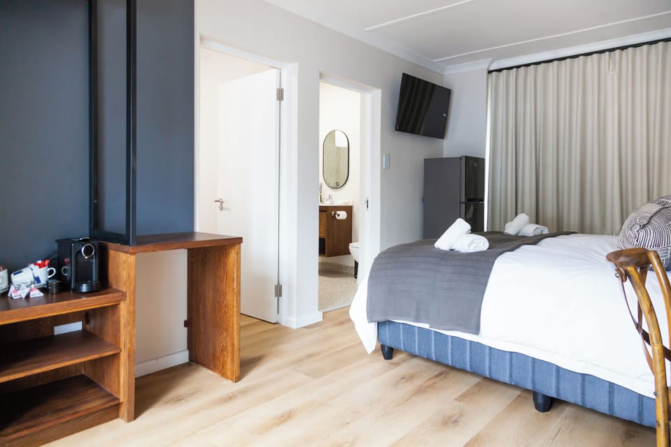 Family Quadruple Room, Patio, Garden View | In-room safe, desk, soundproofing, iron/ironing board